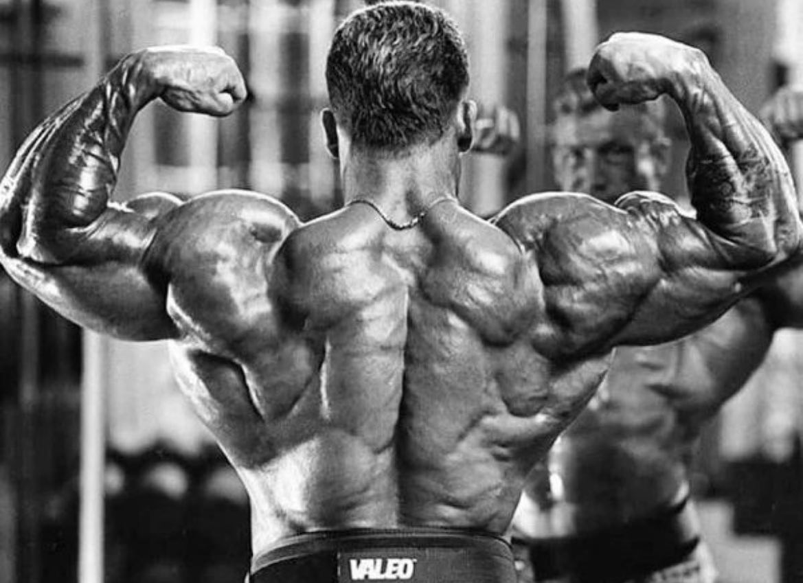 Here’s a pic of Dorian Yates from 1994, post competition hitting the back double bicep pose.